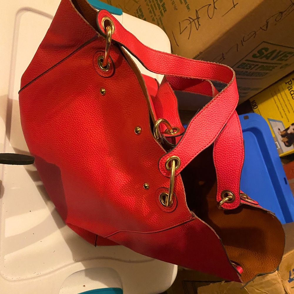 A bright pink bag. Pleather.